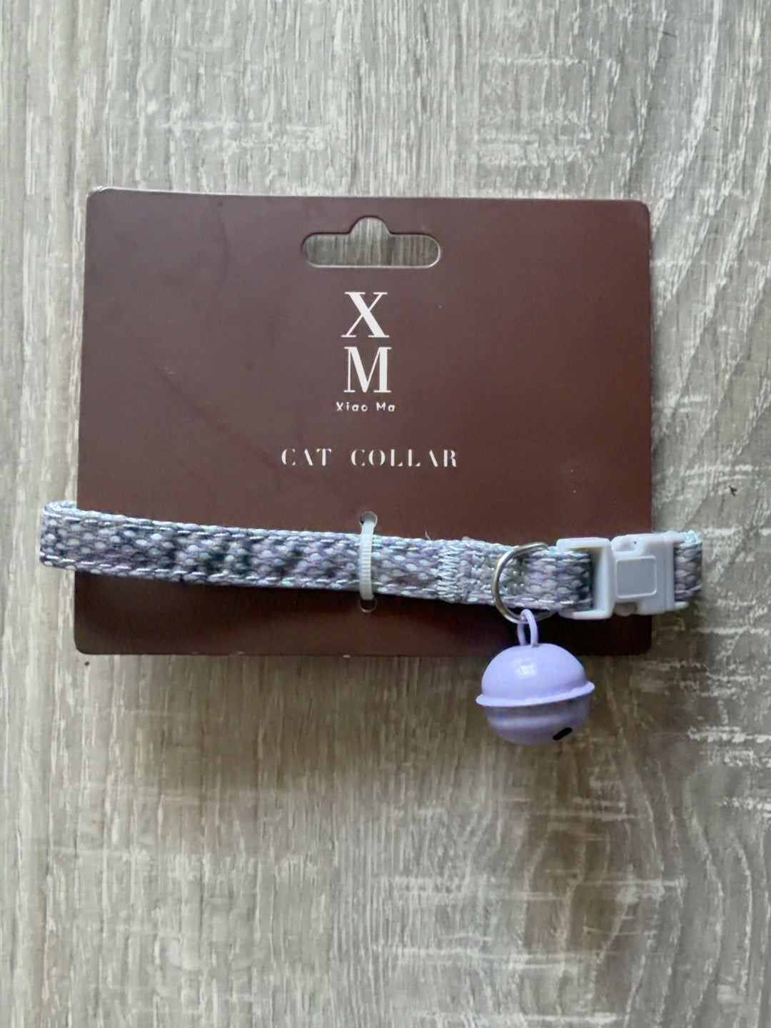 Grigio fantasia con campanellino lilla