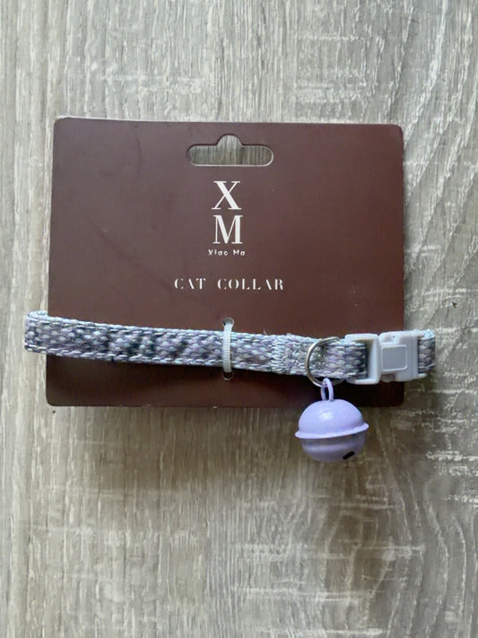 Grigio fantasia con campanellino lilla