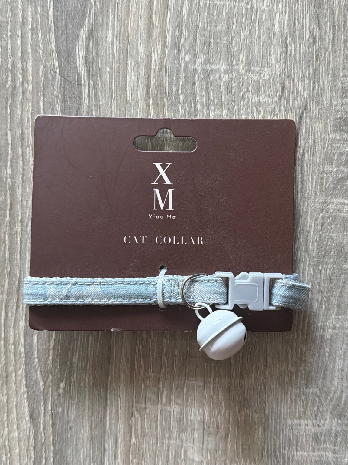 Azzurro jeans con campanellino bianco