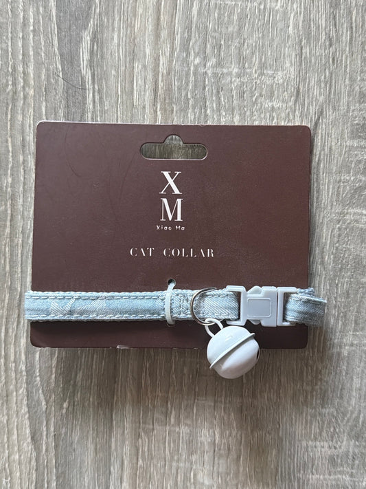 Azzurro jeans con campanellino bianco
